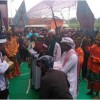Prosesi upacara kawin cai.